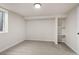 Bedroom with neutral paint, carpet and modern lighting at 7555 E 22Nd Ave, Denver, CO 80207