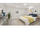 Bedroom featuring a desk, bed and neutral tones at 7555 E 22Nd Ave, Denver, CO 80207