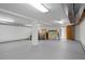 Large, unfinished basement space with concrete floors and white walls at 5736 S Ivy St, Greenwood Village, CO 80111