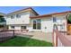 Exterior of home showing the back patio, lawn, and yard at 1791 S Laredo St, Aurora, CO 80017