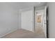Cozy bedroom with neutral colors, carpet, and sliding door closet at 16256 E Otero Pl, Englewood, CO 80112