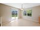 Bright dining area features sliding glass door access to the backyard at 16256 E Otero Pl, Englewood, CO 80112