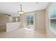 Bright dining area features sliding glass door access to the backyard at 16256 E Otero Pl, Englewood, CO 80112