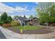Charming single Gathering home with a well maintained lawn, mature trees, and a two car garage at 3844 S Gibralter St, Aurora, CO 80013