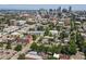 Expansive aerial view of the city skyline with lush greenery and residential neighborhoods at 225 N Lincoln St # 4, Denver, CO 80203