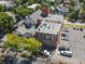 Captivating aerial view of the building, highlighting its unique architecture and parking area at 225 N Lincoln St # 4, Denver, CO 80203