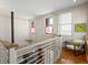 Stairway with stained glass windows, chair and side table at 225 N Lincoln St # 4, Denver, CO 80203
