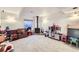 Spacious finished basement with carpet and play area and wood burning stove at 2482 Purcell Pl, Brighton, CO 80601