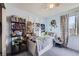 Fun bedroom decorated with toy story themes, playful decorations, and comfortable space for relaxation at 2482 Purcell Pl, Brighton, CO 80601