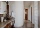 Unique bathroom with a vessel sink, custom vanity, and decorative mirror at 1035 S Elizabeth St, Denver, CO 80209