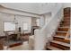 Interior view showcases the dining room, fireplace, staircase, and open-concept design at 1035 S Elizabeth St, Denver, CO 80209
