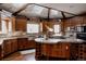 Spacious kitchen with custom wood cabinets, a large island, and modern appliances, perfect for cooking at 1035 S Elizabeth St, Denver, CO 80209