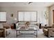Inviting living room showcasing neutral tones, bright windows, and stylish decor at 1035 S Elizabeth St, Denver, CO 80209