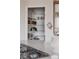 Organized walk-in pantry featuring ample shelving for storage and convenient kitchen essentials at 1035 S Elizabeth St, Denver, CO 80209