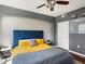 Comfortable bedroom featuring stylish decor, a cozy bed, and plenty of natural light at 1747 N Pearl St # 306, Denver, CO 80203