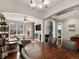 Spacious living area with hardwood floors, modern lighting, and an open layout perfect for entertaining at 1747 N Pearl St # 306, Denver, CO 80203