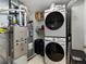 Well-equipped utility room with washer, dryer, water heater and furnace at 1747 N Pearl St # 306, Denver, CO 80203
