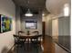 Dining area with wood table and black chairs at 891 14Th St # 1006, Denver, CO 80202