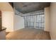 Living room with balcony access and city views at 891 14Th St # 1006, Denver, CO 80202