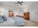 Bedroom featuring natural light, a ceiling fan, and neutral carpeting at 1168 Basalt Ridge Loop, Castle Rock, CO 80108