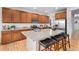 Modern kitchen featuring granite countertops, stainless appliances, and a functional center island at 1168 Basalt Ridge Loop, Castle Rock, CO 80108