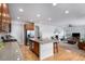 Open-concept kitchen flows seamlessly into the living area, perfect for entertaining at 1168 Basalt Ridge Loop, Castle Rock, CO 80108