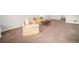 Spacious carpeted living room with ample seating, perfect for relaxing or entertaining at 1168 Basalt Ridge Loop, Castle Rock, CO 80108