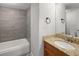 Modern bathroom features a tiled shower, granite vanity and modern fixtures, offering a comfortable and stylish space at 7970 W 90Th Ave # 115, Broomfield, CO 80021