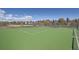 A basketball court at Dutch Creek Village Recreation Center, complete with a tennis court next to it at 6487 W Weaver Ave, Littleton, CO 80123