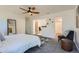 Spacious bedroom with lots of light and an ensuite bathroom and walk-in closet provides comfort and convenience at 6487 W Weaver Ave, Littleton, CO 80123
