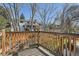 An outdoor deck provides beautiful views of the landscaped backyard at 6487 W Weaver Ave, Littleton, CO 80123