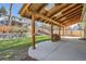 Covered patio featuring an open beam ceiling with skylights, offering the perfect outdoor entertaining space at 6487 W Weaver Ave, Littleton, CO 80123