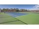 Outdoor tennis court at the Dutch Creek Village Recreation Center at 6487 W Weaver Ave, Littleton, CO 80123