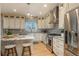 Chef's kitchen with stainless appliances at 781 Deer Clover Cir, Castle Pines, CO 80108