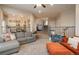 Cozy living room and staircase at 781 Deer Clover Cir, Castle Pines, CO 80108