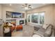 Comfortable living room with fireplace, bright windows, and stylish furniture at 781 Deer Clover Cir, Castle Pines, CO 80108