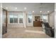 Spacious main bedroom with large windows, natural light, neutral carpet, and comfortable seating area at 781 Deer Clover Cir, Castle Pines, CO 80108