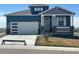 Charming home with a two-car garage, lovely front porch, and inviting curb appeal at 42996 Colonial Trl, Elizabeth, CO 80107
