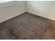 Neutral bedroom with carpet flooring and large window at 4348 Sable St, Denver, CO 80239