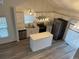 Modern kitchen featuring stainless steel appliances, a kitchen island, and an open layout at 4348 Sable St, Denver, CO 80239