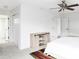 Bright bedroom with barn wood cabinet and ceiling fan at 24505 E Wagon Trail Ave, Aurora, CO 80016
