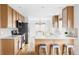 Well-lit kitchen with modern appliances and ample counter space at 24505 E Wagon Trail Ave, Aurora, CO 80016