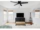Spacious living room with sleek ceiling fan and contemporary decor at 24505 E Wagon Trail Ave, Aurora, CO 80016