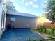The home's backyard features mature landscaping, leading to a private patio at 19156 E Arizona Pl, Aurora, CO 80017