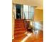 Open staircase with hardwood steps and views of the lower level at 19156 E Arizona Pl, Aurora, CO 80017