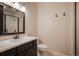 Bathroom with a large mirror and walk-in shower at 17548 Colonial Park Dr, Monument, CO 80132