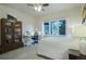 Bright bedroom with a large window offering natural light, bookshelf and cozy decor at 17548 Colonial Park Dr, Monument, CO 80132