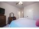 Cozy bedroom with a walk-in closet and ensuite bath at 17548 Colonial Park Dr, Monument, CO 80132