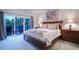Comfortable main bedroom featuring an attached deck perfect for relaxation at 17548 Colonial Park Dr, Monument, CO 80132