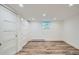 Finished basement with hardwood floors, recessed lighting, and closet space at 1519 16Th St, Boulder, CO 80302
